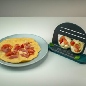 Omelete Caprese crocante e delicioso preparado na Airfryer. O omelete é recheado com queijo mussarela derretido, tomates suculentos e folhas frescas de manjericão, criando uma combinação de sabores clássica e apetitosa.