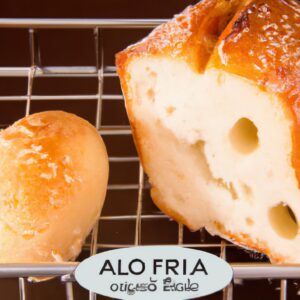 Imagem de pão de alho congelado sendo cozido em uma Airfryer. O pão de alho é dourado e tem salsa fresca salpicada por cima.