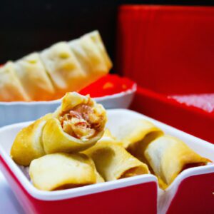Imagem de um prato com lasanha recém-assada em uma airfryer. A massa da lasanha é coberta com um rico molho de tomate e queijo derretido. A lasanha é assada até dourar e borbulhar.