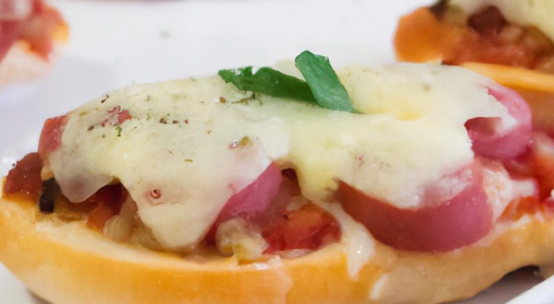 Pizza quadrada caseira feita com massa de rap10 cozida na airfryer, pronta em apenas 10 minutos. A pizza tem uma crosta crocante e dourada e é coberta com molho de tomate, queijo e os seus ingredientes favoritos.