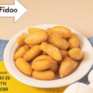 Uma foto de almôndegas douradas e crocantes cozidas em uma Airfryer. As almôndegas são feitas com carne moída, pão ralado, ovo, cebola e especiarias e têm um molho vermelho espesso.
