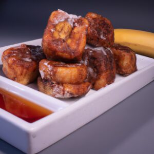 Imagem de bananas fatiadas cobertas com uma mistura de canela e açúcar em uma cesta da Airfryer. A Airfryer é preta e vermelha, e a cesta é branca. A imagem mostra como fazer uma sobremesa de banana na Airfryer.
