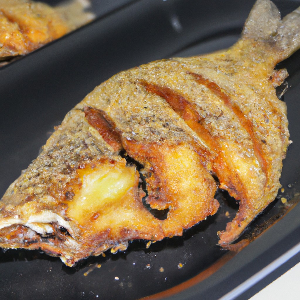 Tilápia Na Airfryer: Crocante Por Fora E Macio Por Dentro 1 Tilápia crocante preparada na airfryer, com pele dourada e crocante destacando-se do filé branco macio e suculento. A textura contrastante cria uma experiência gastronômica deliciosa.