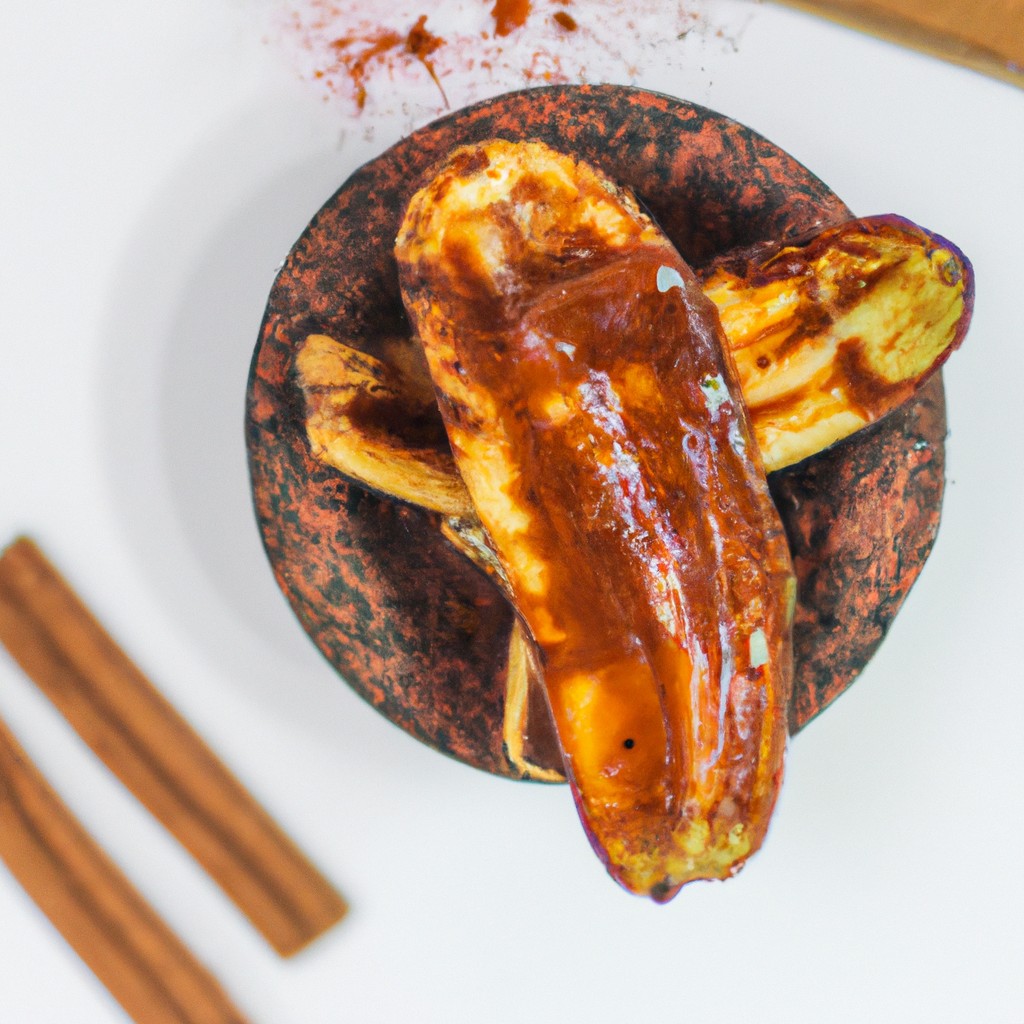 Imagem de uma banana caramelizada crocante cozida em uma Air Fryer, com um exterior dourado e um interior macio e caramelizado.