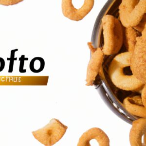 Imagem de biscoitos de polvilho crocantes e dourados feitos na Airfryer, dispostos em uma cesta forrada com papel manteiga. Os biscoitos têm uma textura crocante e são polvilhados com queijo parmesão ralado.