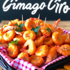 Imagem de camarões empanados e fritos servidos em mini morangas assadas. Os camarões estão dourados e crocantes, enquanto as morangas estão macias e suculentas. O prato é guarnecido com ervas frescas e limão.