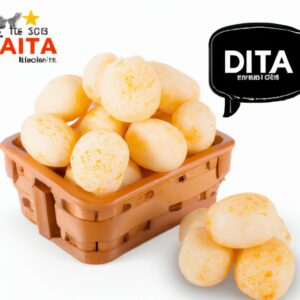 Dadinhos de tapioca crocantes feitos na Airfryer, servidos em um prato branco. Os dadinhos são dourados e têm um formato quadrado, com uma textura crocante e um interior macio. A imagem mostra o prato de cima, com os dadinhos dispostos de forma aleatória.