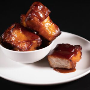 Imagem de um filé suíno grelhado na Airfryer, coberto com uma crosta crocante e dourada de mostarda e mel. O filé é suculento e tenro por dentro, com um sabor doce e picante da mostarda e do mel. Ele está acompanhado por vegetais assados, como brócolis, cenouras e batatas, que são macios e caramelizados.