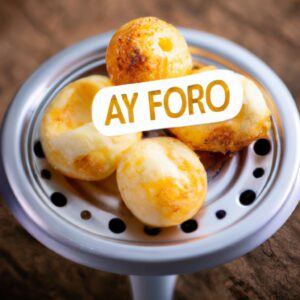Imagem de nuvens de ovos fofas e douradas preparadas em uma Airfryer. As nuvens de ovo são moldadas em divertidas formas de nuvem e têm uma textura crocante por fora e macia e fofa por dentro.